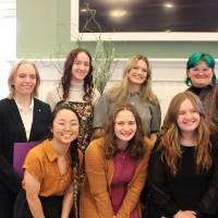 A group photo of the graduating Triota members